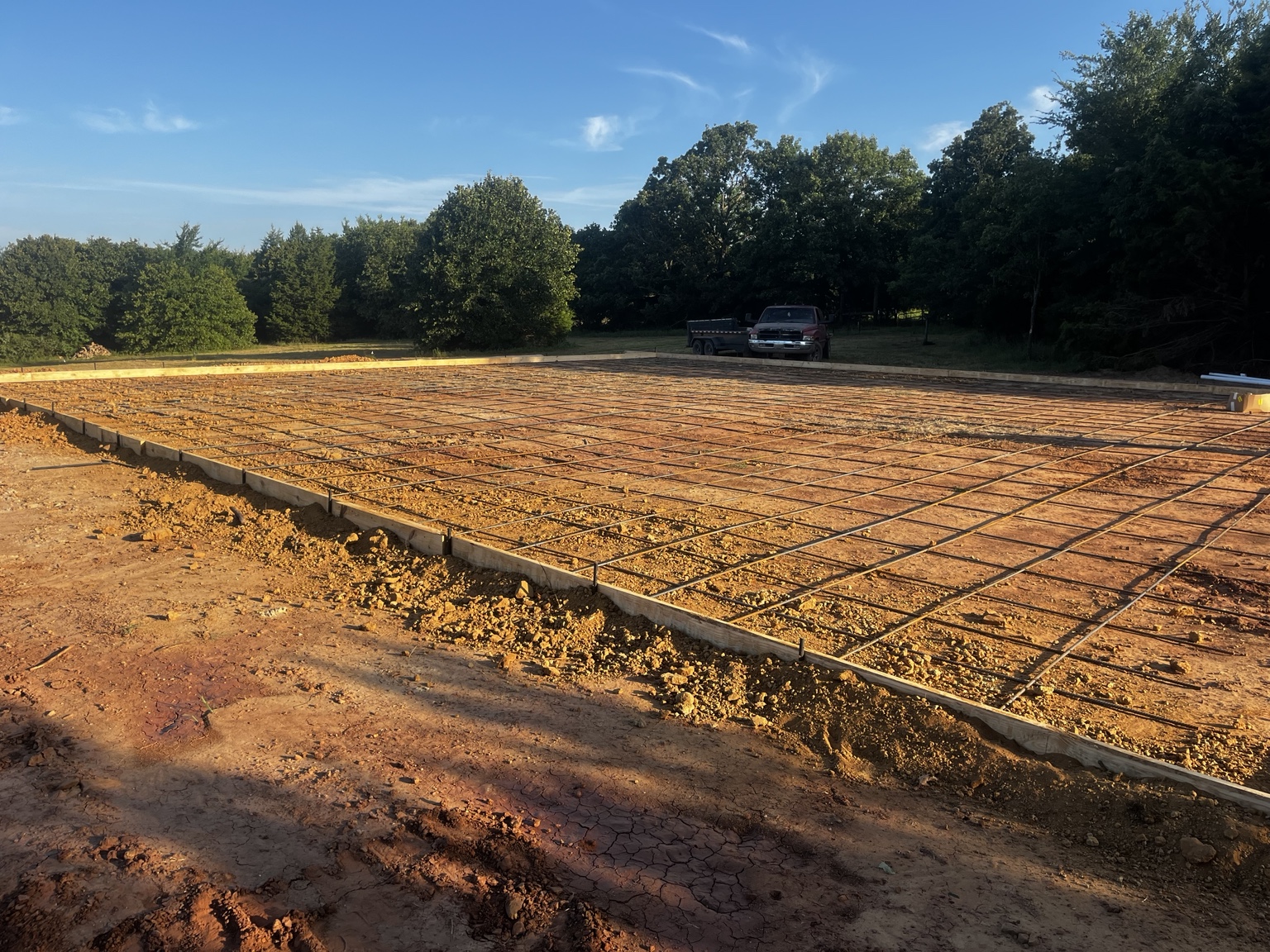 Concrete slab preparation with reinforcing steel